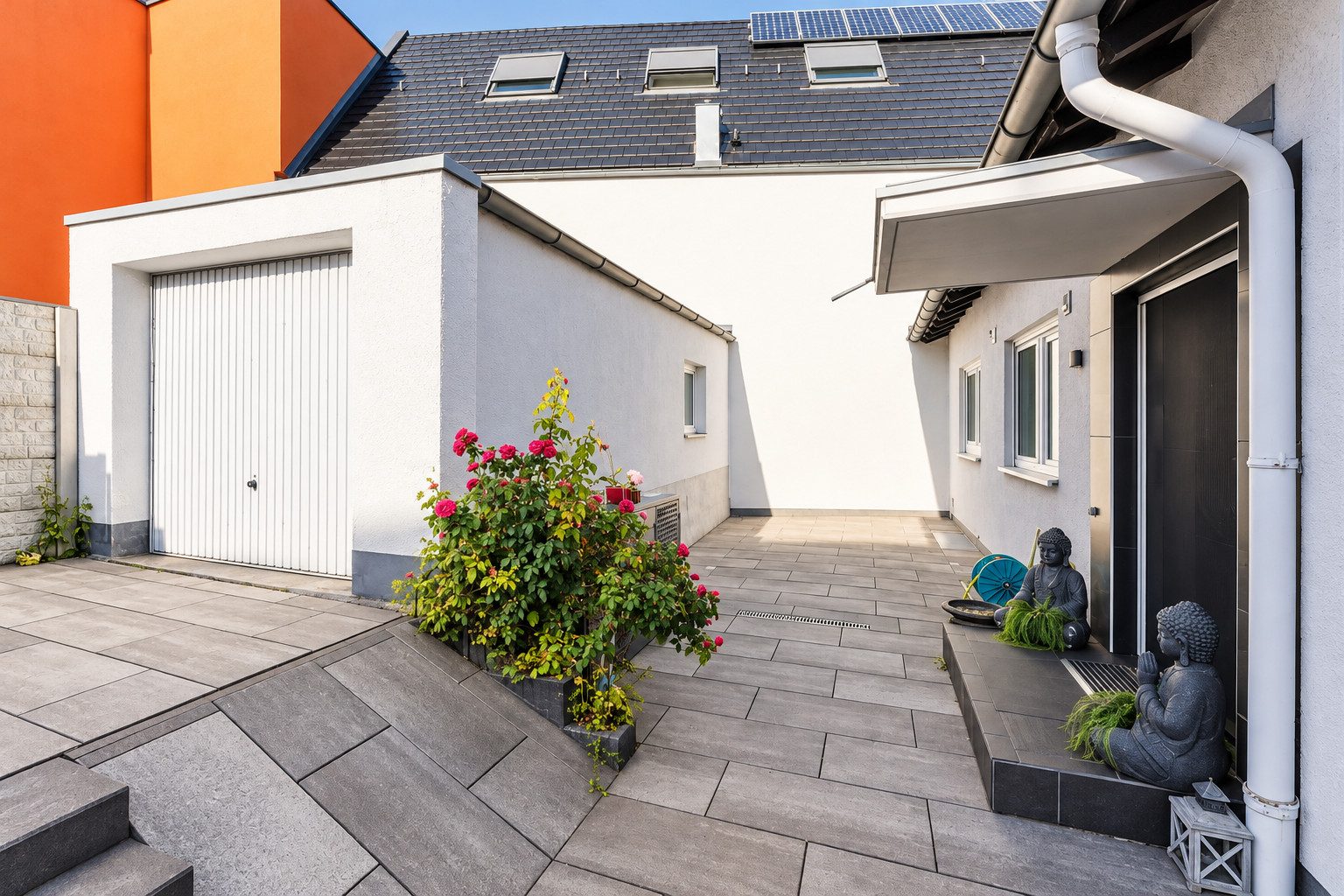 WE 1- Außenansicht mit Garten